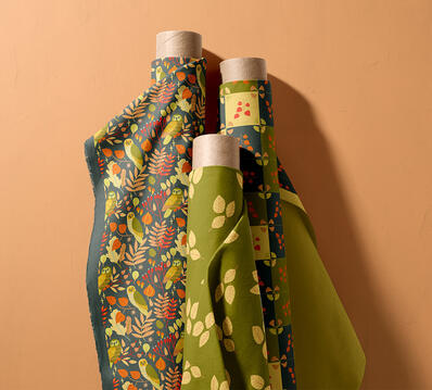 Fabric rolls with autumn pattern with owls